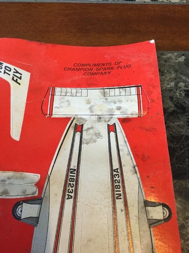 Vintage Rare Compliments Of Champion Spark Plug Company Punch Out Airplane Toy