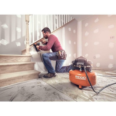 Ridgid 6 Gal. Compressor 150 PSI 50ft Lay Flat Hose and 18GA Brad Nailer Tool