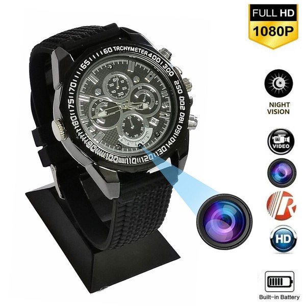 Black wristwatch with hidden camera features on stand.