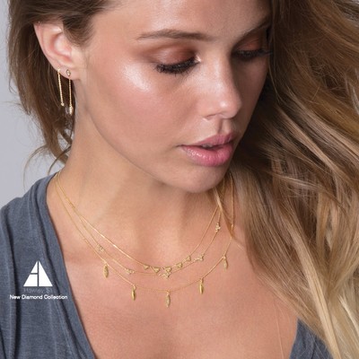 14k Yellow Gold Diamond Necklace with Graduated size Hearts and Diamond Accents