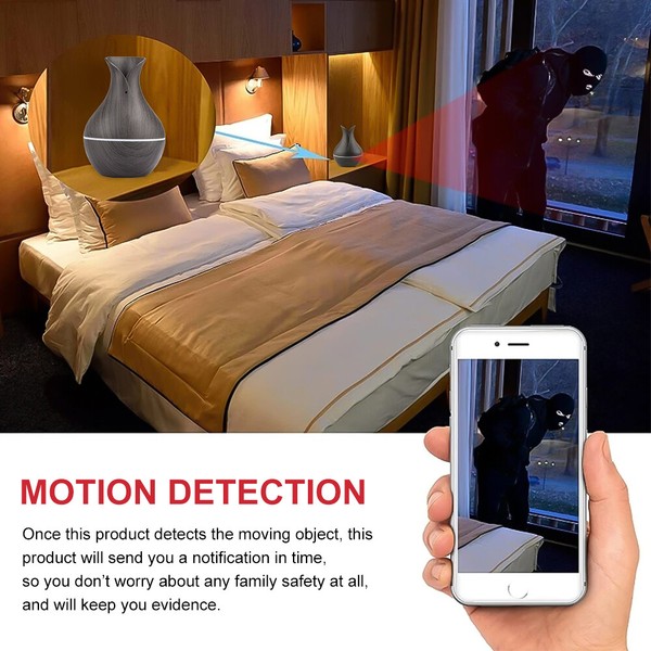Security camera app detecting intruder in home bedroom.