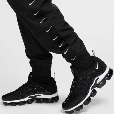 nike swoosh tape joggers