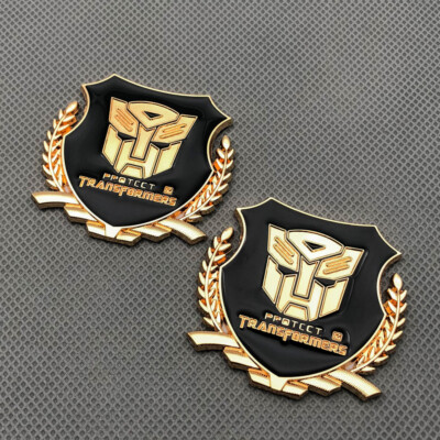 2Pcs Golden Metal Fender Transformers Autobots Logo Emblem Rear Lid Trunk Badge