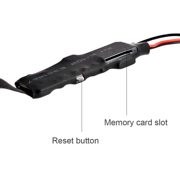 Electronic device with memory card slot and reset button.