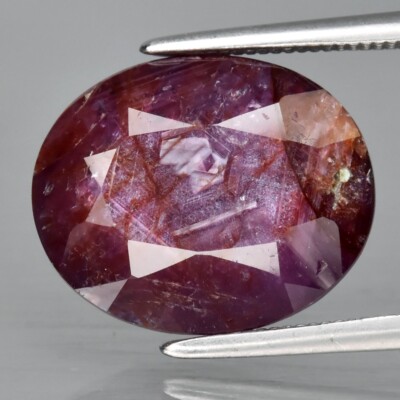 8.91ct 13.3x11mm Oval Purplish Red Ruby Gemstone Africa (Heated Glass Filling)