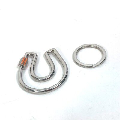 Hermès Sellier charm key ring Hermès Key Ring: Polished Metal Design