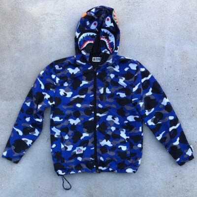 ジャケット・ブルゾン APE  COLOR CAMO HOODIE JACKET 140 BLUE COLOR CAMO BAPE HOODIE JACKET | bape.com