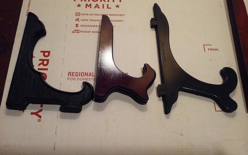 LOT OF 5, MIXED SIZES & MATERIALS OF PLATE STANDS, EASELS.