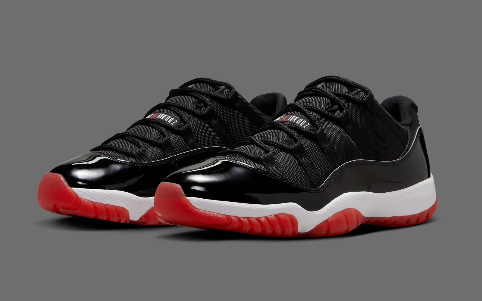 NIKE Air Jordan 11 Low ブラック/レッド AIR JORDAN - RETRO 11 LOW - BLACK/VARSITY RED/WHITE