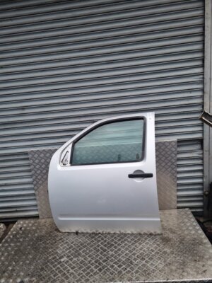 NISSAN NAVARA D40 DOOR FRONT PASSENGER SIDE SILVER 2006-2008