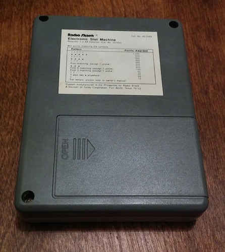 Radio Shack Slot Machine vintage LCD Mini handheld electronic game 60-2464 WORKS