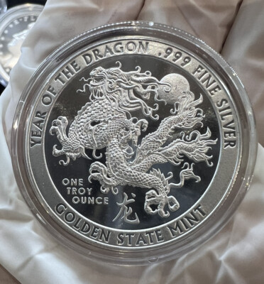 2024 Year of the DRAGON 1 oz .999 FINE SILVER BU ROUND IN A CAPSULE