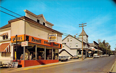 1968 NY Tannersville Rexall Drug Store Main Street postcard A86