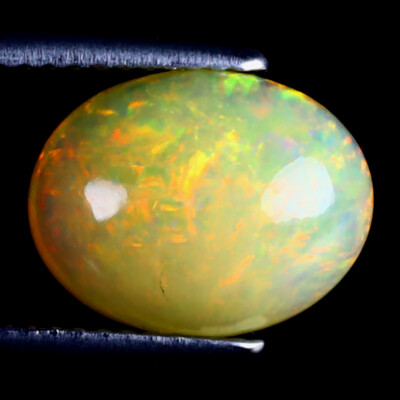 3.03 ct Five-star Oval Cabochon (12 x 9 mm) Ethiopian Flashing Rainbow Opal