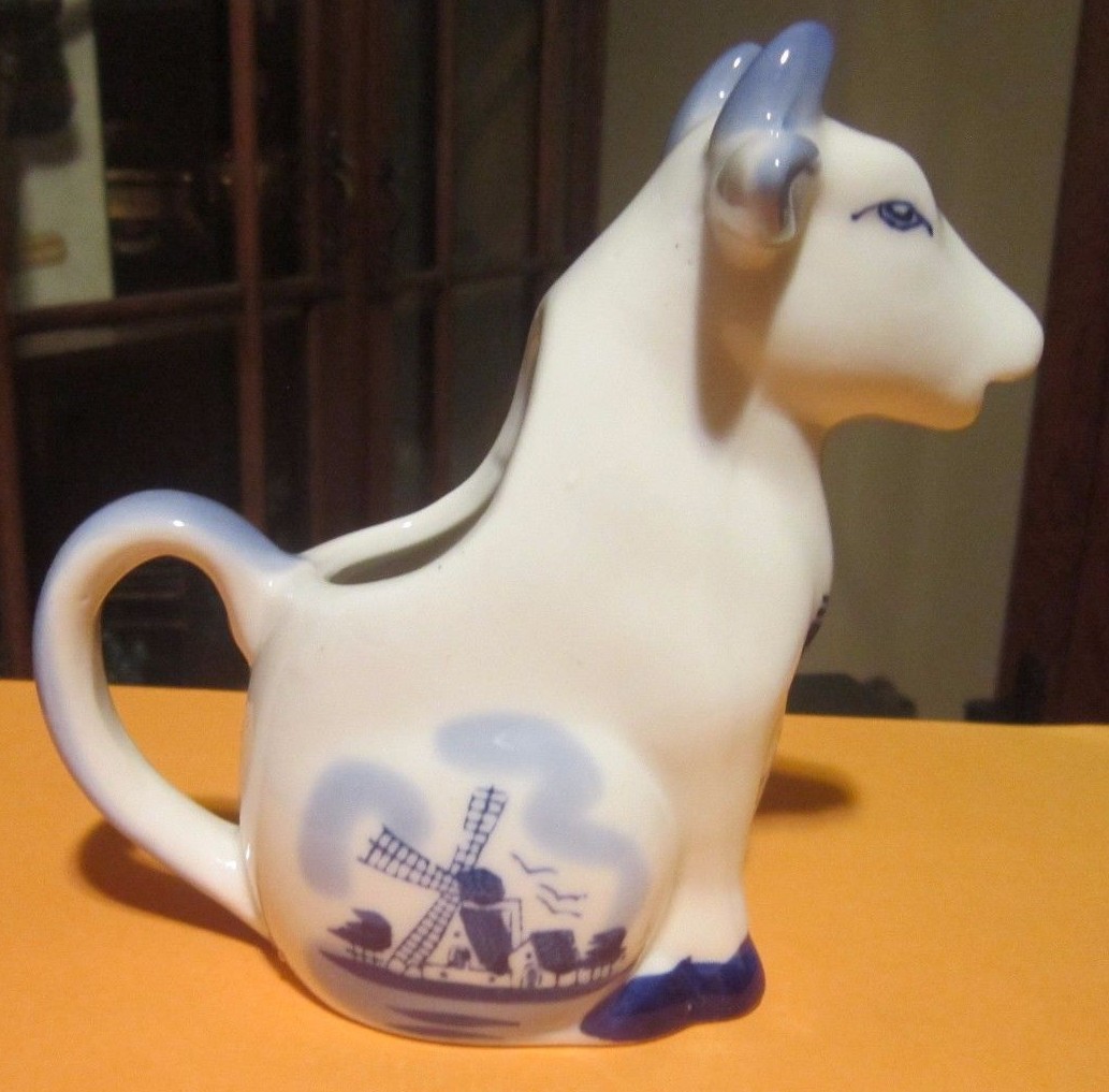 Cobalt Blue and White Windmill Sitting Cow Creamer
