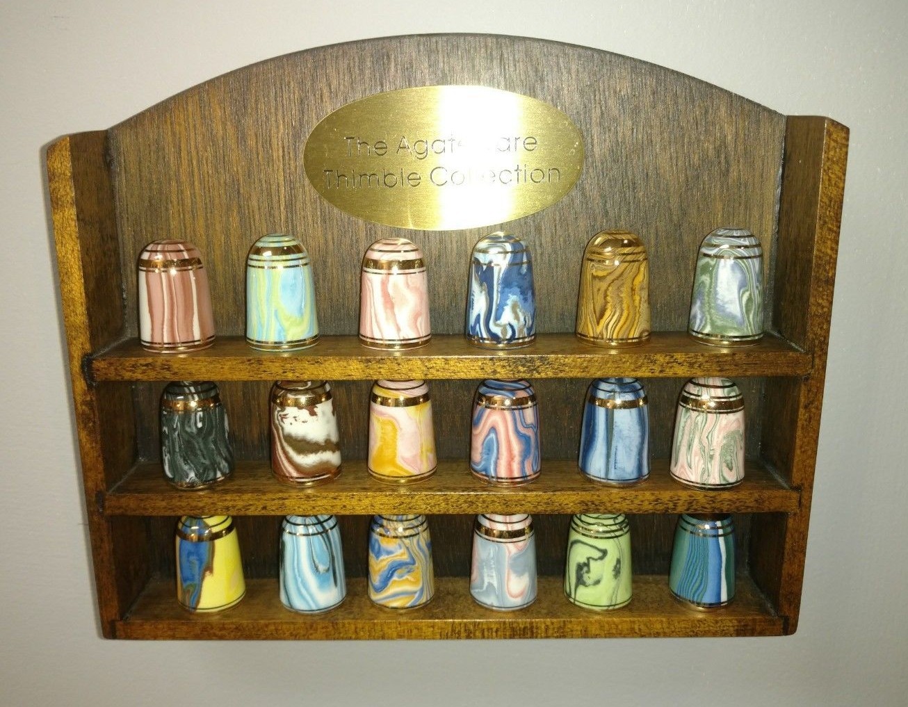 18 - agateware thimbles with original display stand