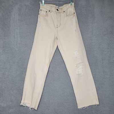 Beige distressed store jeans