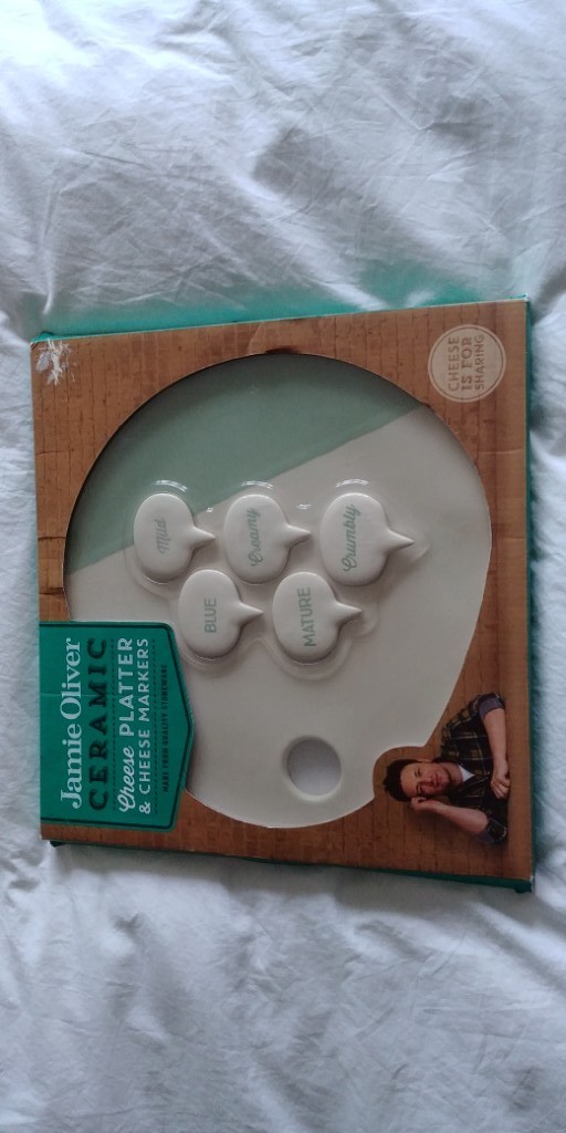 Jamie Oliver ceramic cheese board with cheese labels. in Leeds, West