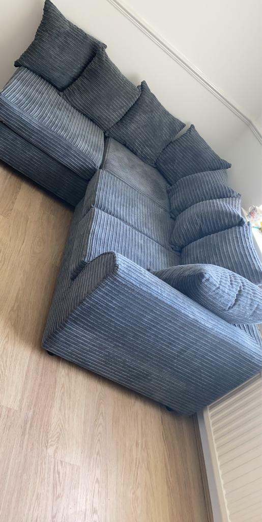 Grey fabric cord corner sofa in NewcastleunderLyme, Staffordshire