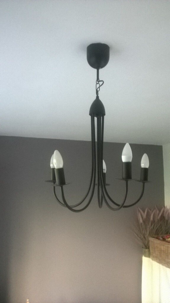 black pendulum ceiling light upturned candle bulbs, chandelier like