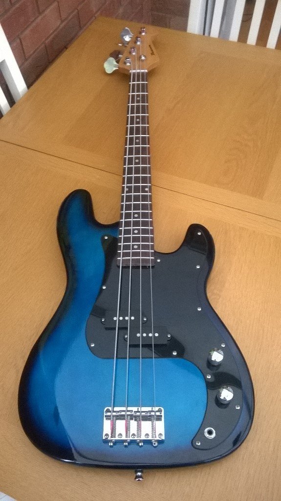 Bass guitar starter package by Benson , guitar amp and lead. in