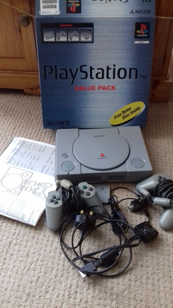 Great gift Playstation 1 console with box & instructions. Free Demo games also plays Audio CDs