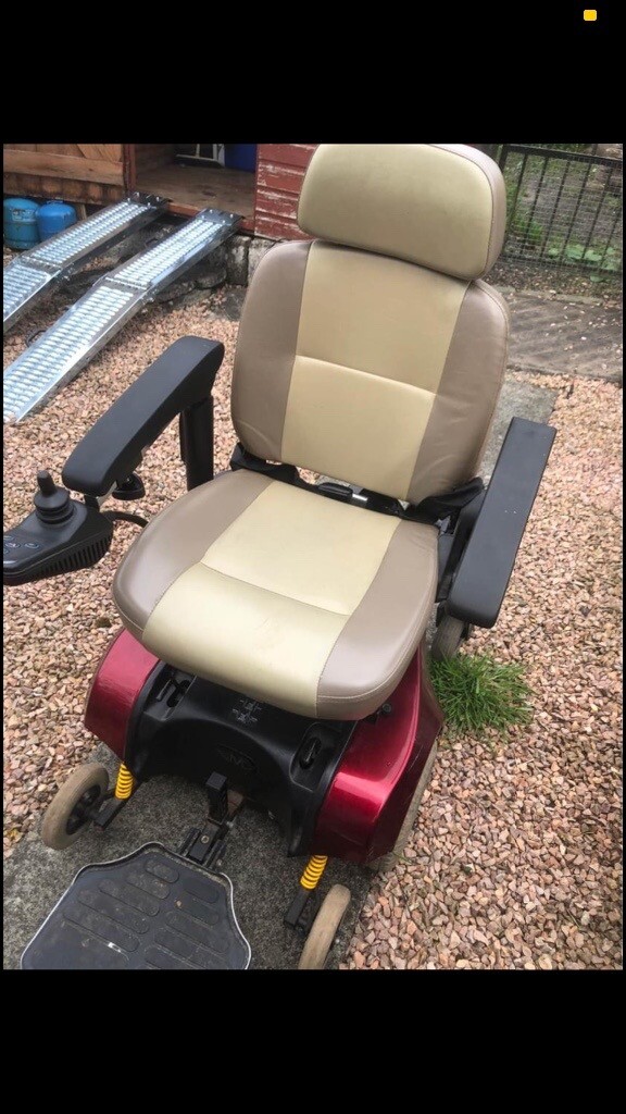 Electric wheelchair with folding ramps in Perth, Perth and Kinross