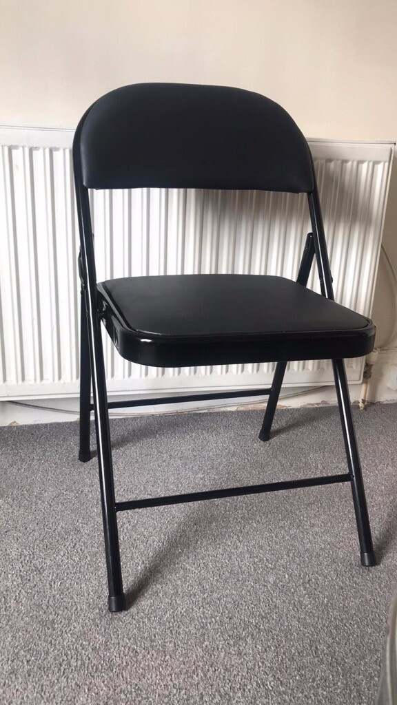 Black folding chair for indoors or garden , comfortable leather like