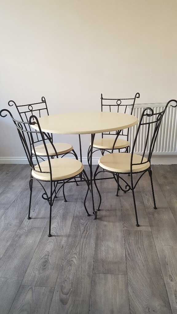 Cast iron dining table and 4 chairs in Wilsden, West Yorkshire Gumtree