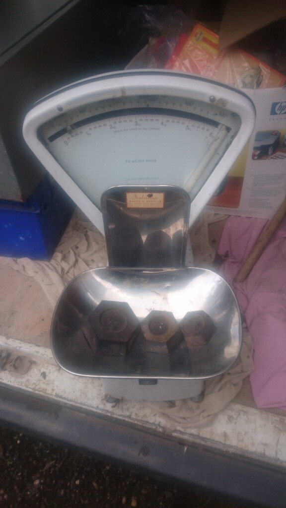 Old vintage shop dry goods weighing scales with weights and tray in