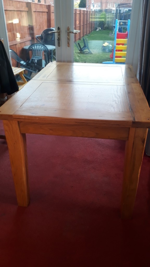 Barker and Stonehouse solid oak extendable dining table and 6 chairs