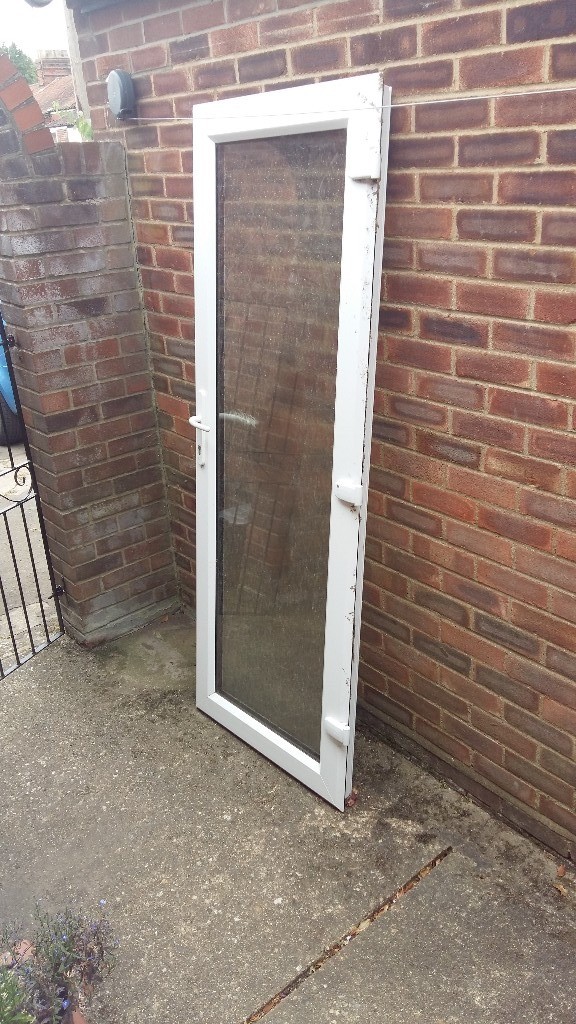 UPVC door & frame with fitted frosted glass. In good condition surplus