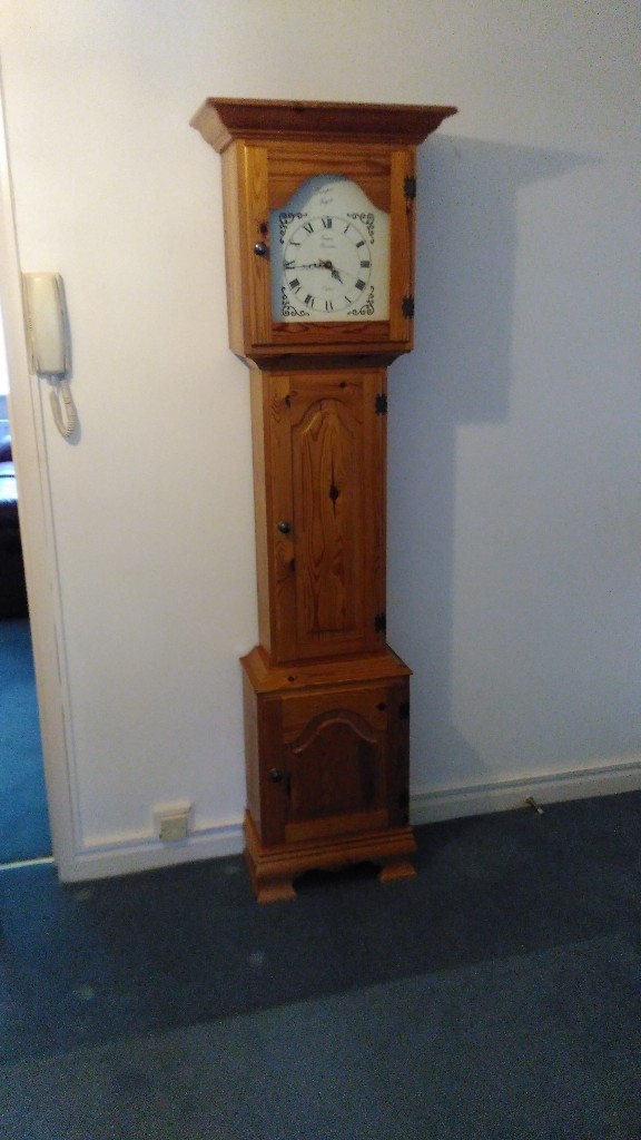 Grandfather clock in pine with 3 storage cupboards battery operated