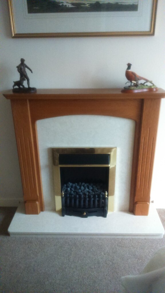 Coal effect electric fire. Marble and wood surround. Easily mounted to