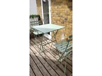 Outdoor bar style table and chairs