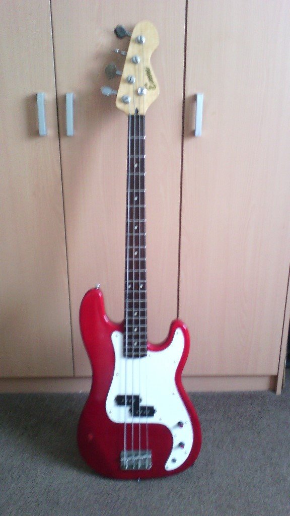 for sale a vintage burgundy red encore bass guitar in good playing and