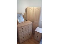 Bedroom furniture set: wardrobe, chest of five drawers, bedside table and 3-leaf mirror
