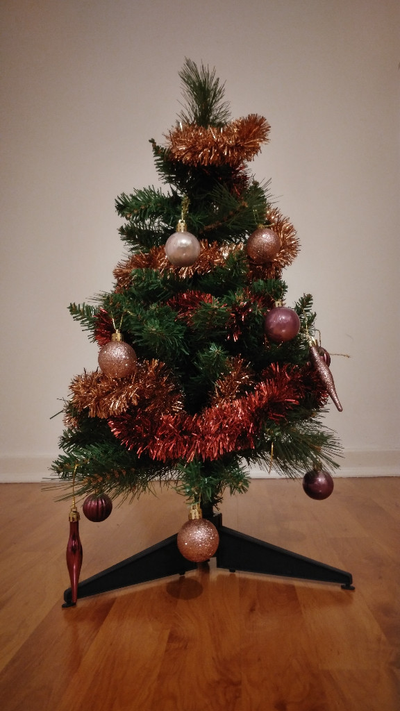 Small Christmas  tree with tinsel and baubels in Trafford 