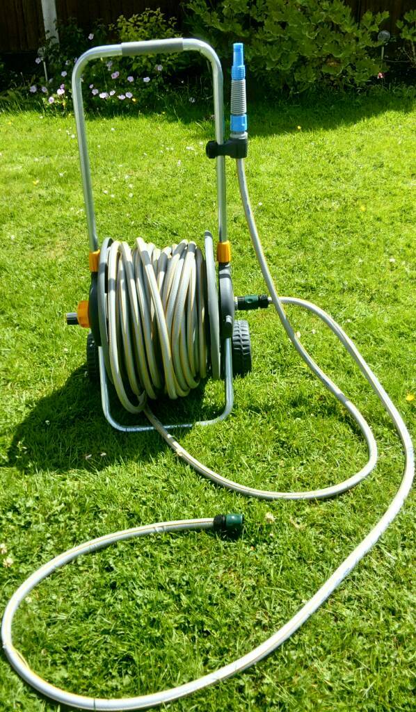 Garden Hose on Reel. 45m. With spray nozzle and connectors  