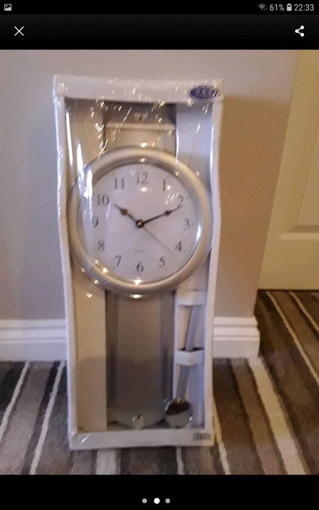 Silver rectangle wall clock with ding dong handle new still boxed in