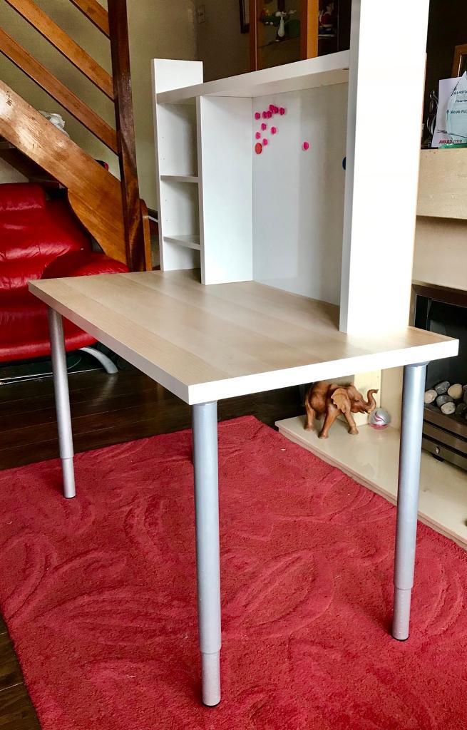 Ikea desk with whiteboard and adjustable legs in Leigh