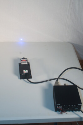 473 nm diode pumped solid state laser and power supply