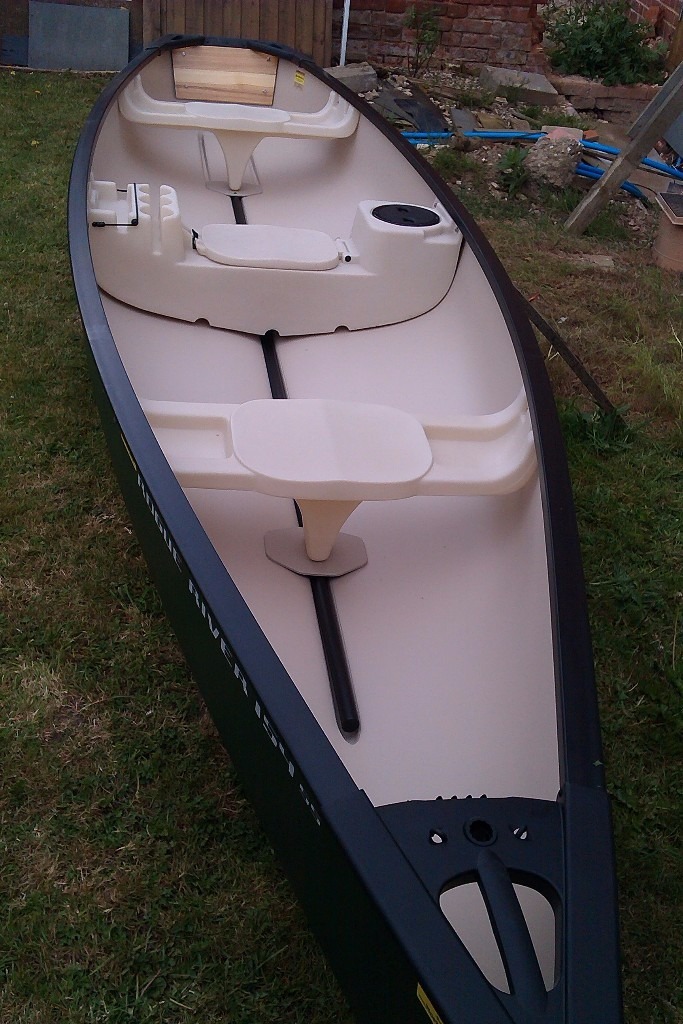 For sale Rogue River Canadian type canoe with square stern and 2.5hp