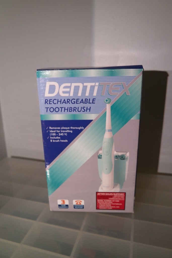 Dentitex rechargeable Electric toothbrush with replacement heads. in