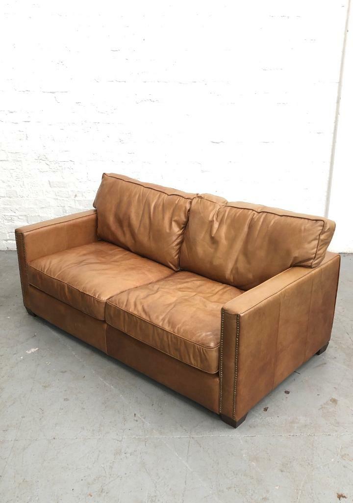 Halo tan distressed leather two seater sofa in South Kensington