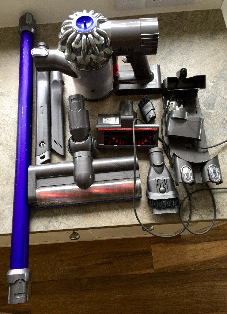 Dyson V6 Cordless Vacuum Cleaner with Wall unit, charging lead and
