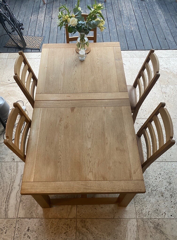 Extendable oak dining table and matching chairs from John Lewis | in