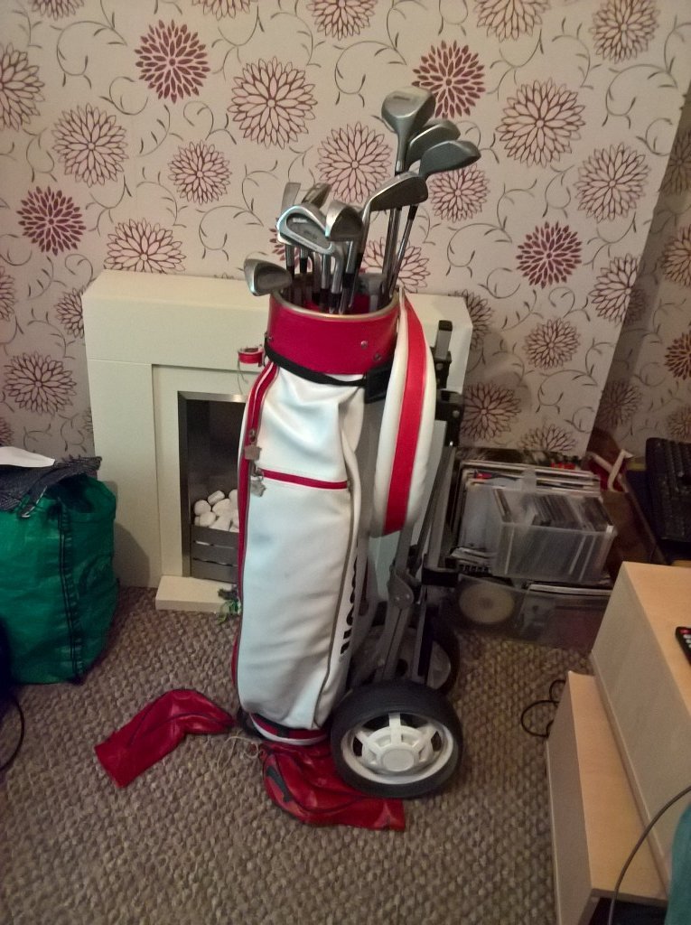 Wilson golf clubs with bag and trolley.Very good condition hardly used