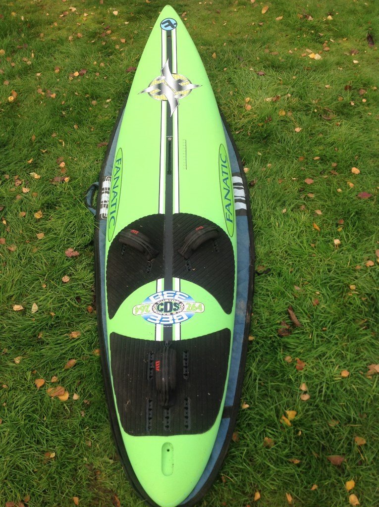 Fanatic windsurfing equipment; various boards, sails and masts in