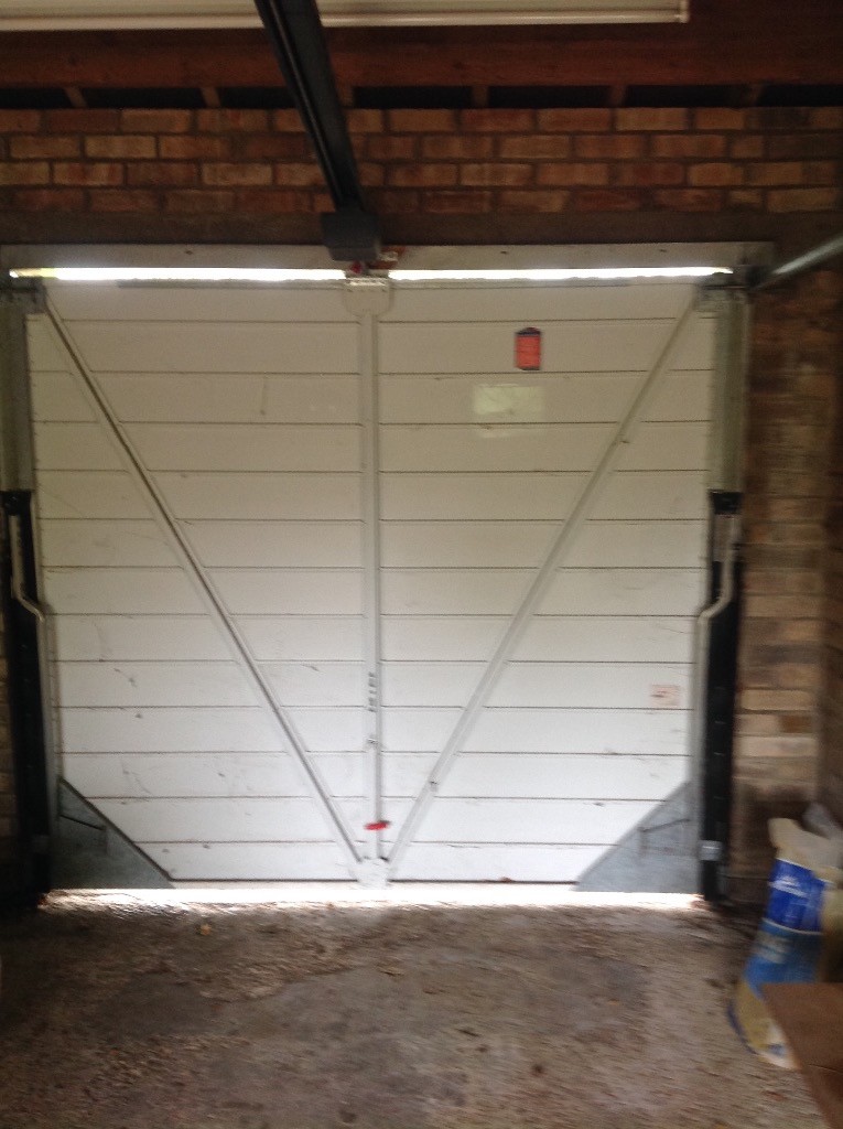 metal electrically operated garage door, good condition, fully working, 2x2.23m, made by